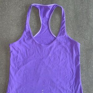 Lululemon Cool Racerback Athletic Tank Top. Solid light purple, white stitching